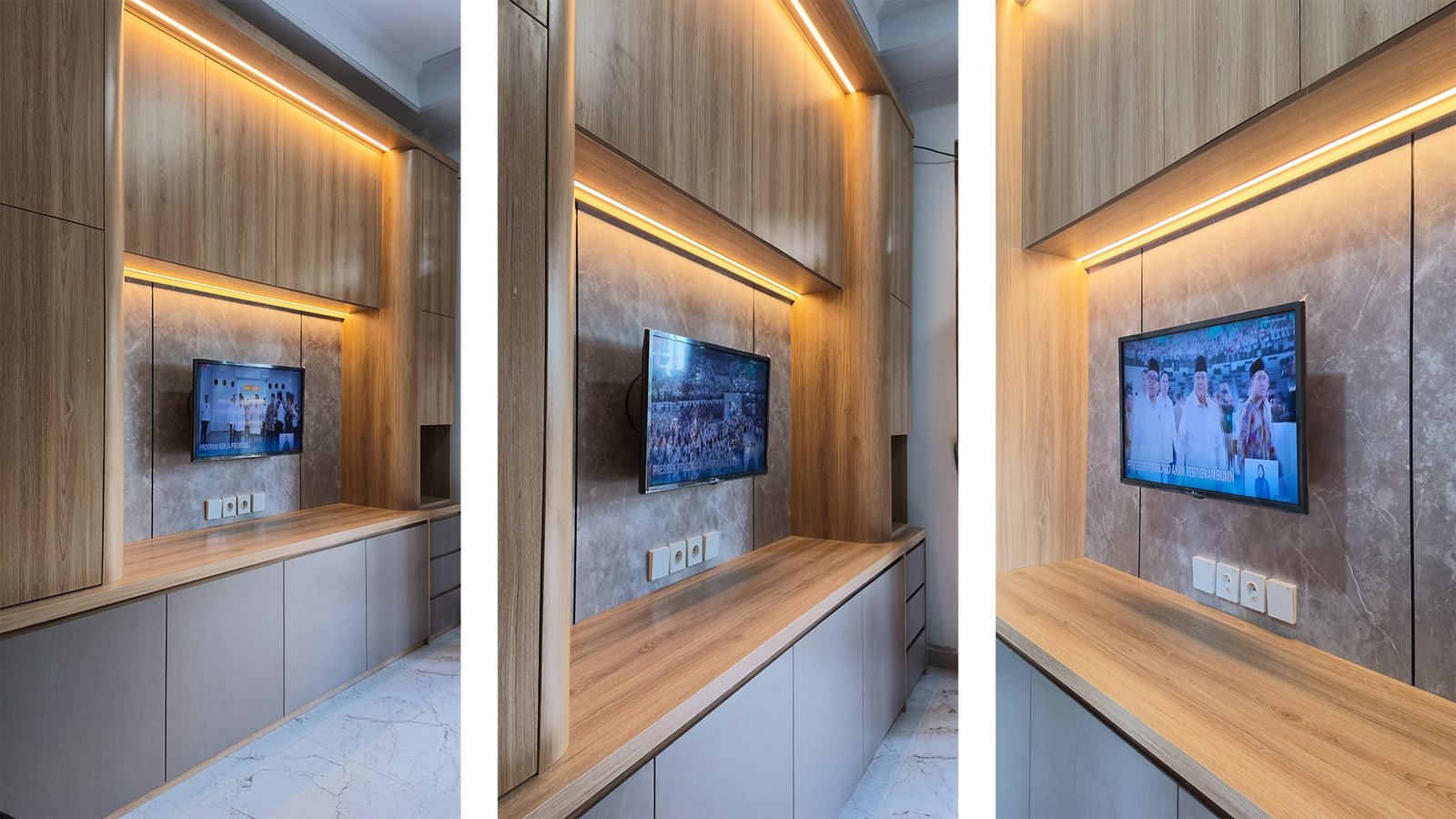 Kabinet televisi dengan panel bernuansa kayu dan pencahayaan hangat dari portofolio New Raj Signature